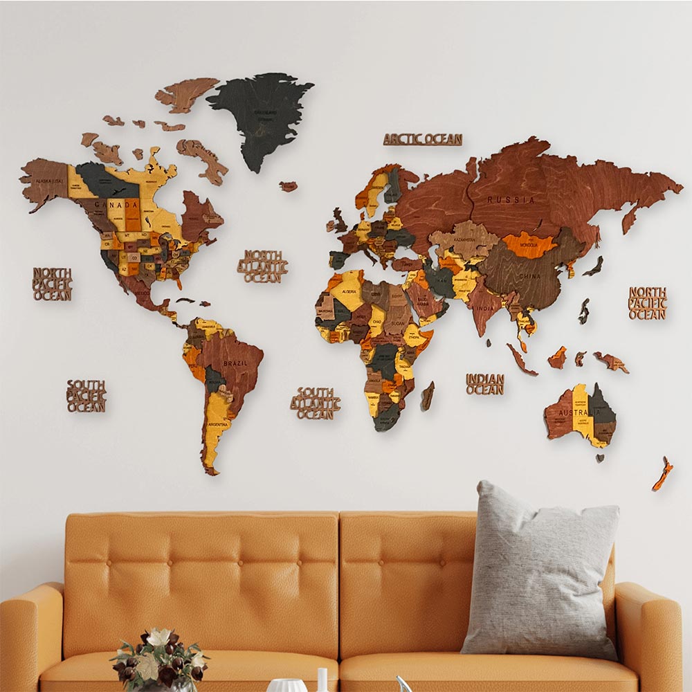 Wooden world map wall decoration in a living room with a brown sofa.