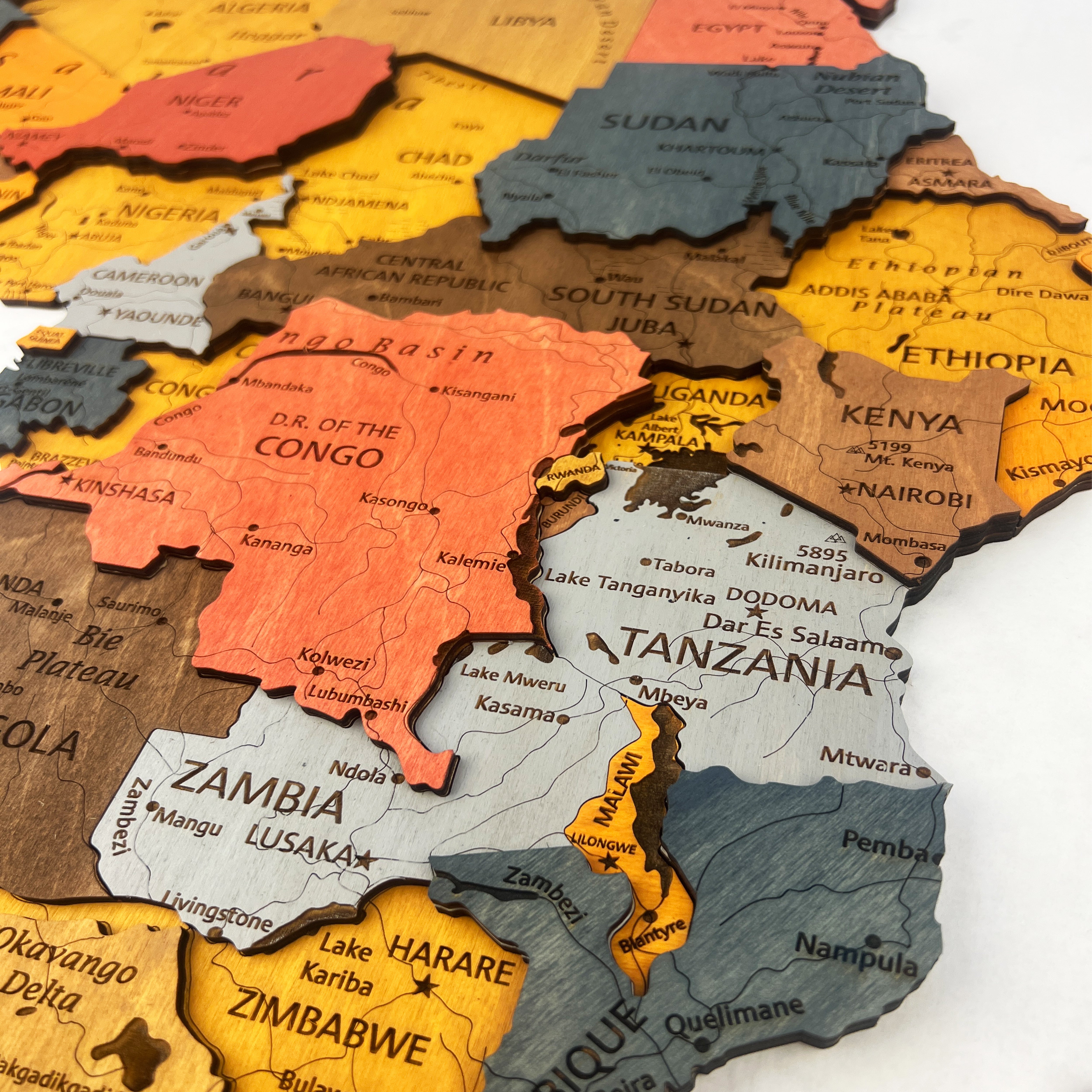 Wooden puzzle map of Africa with each country shaped like a puzzle piece.
