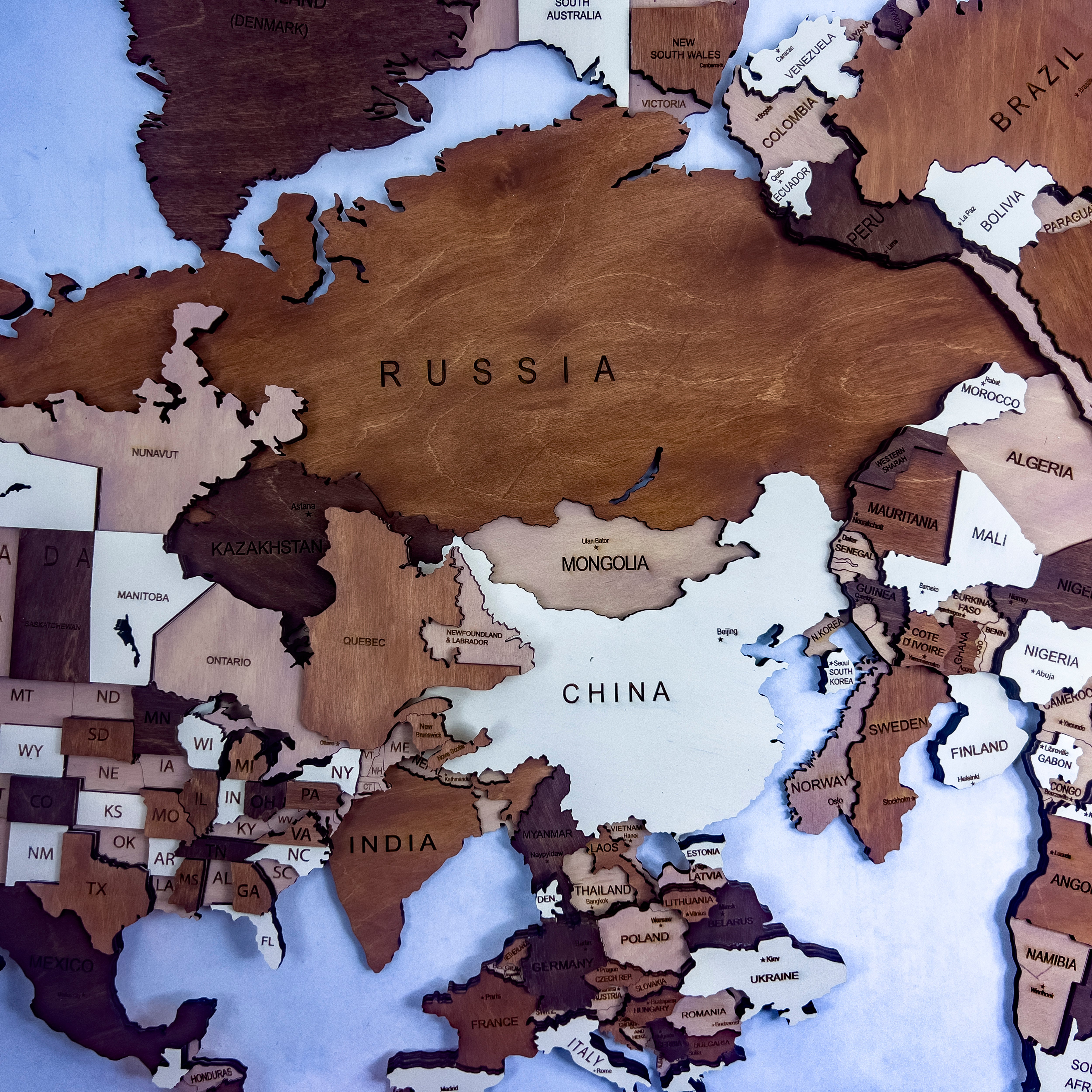 wooden map in dark brown vs light brown tones