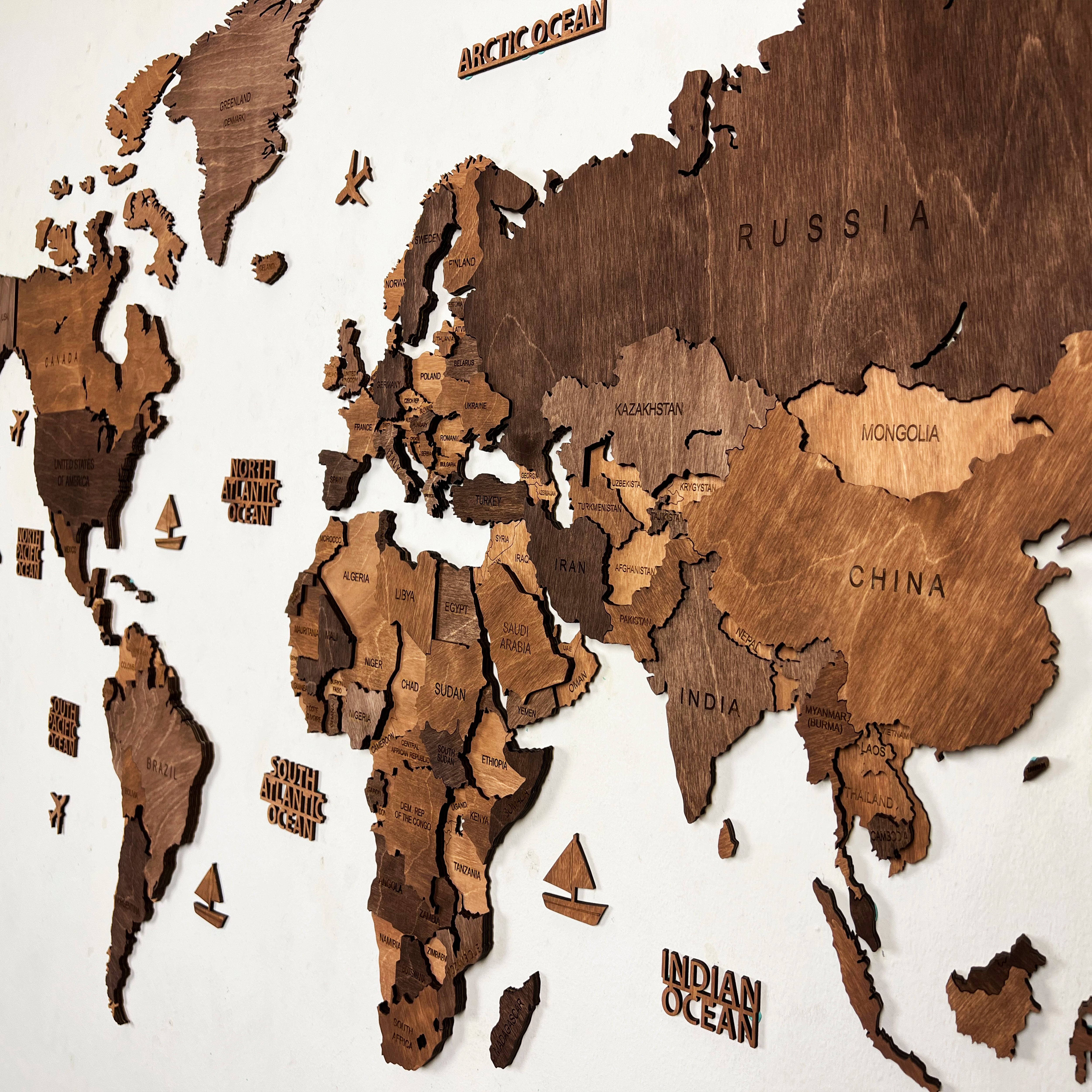 wooden map in dark brown vs light brown tones