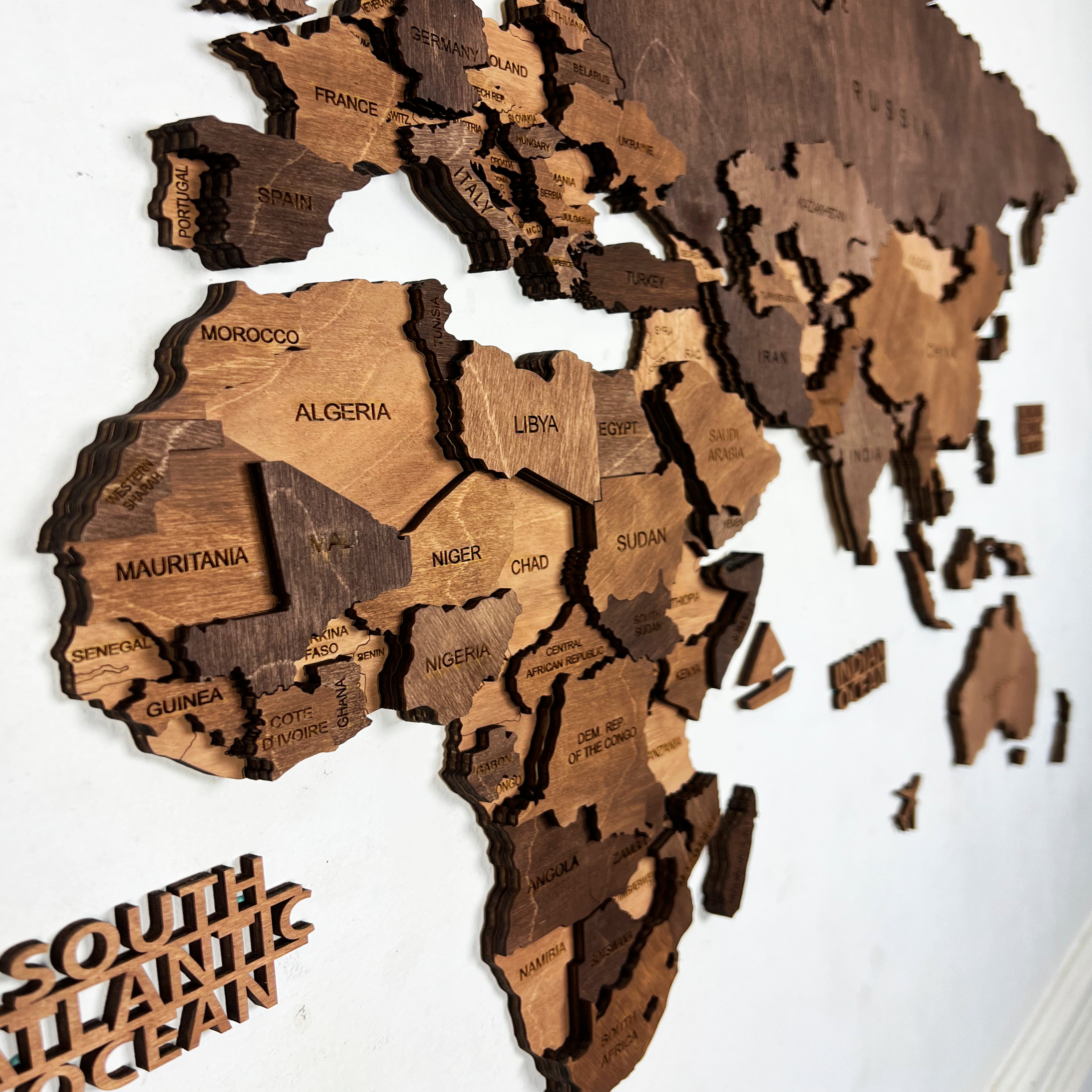 laser cut birch plywood details on wooden world map