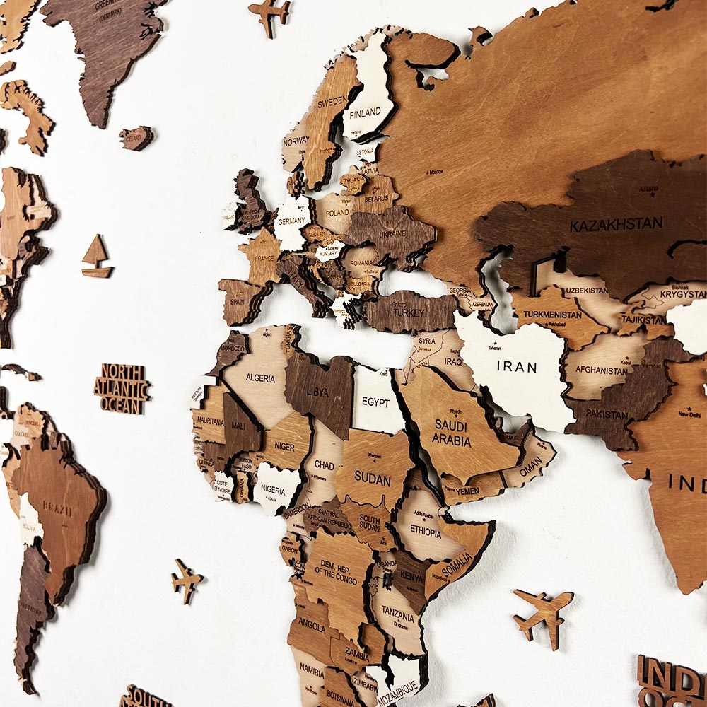Wooden world map puzzle on a white background