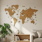 Large 3D cork world map 190x95 cm with 40 colorful push pins on a living room wall